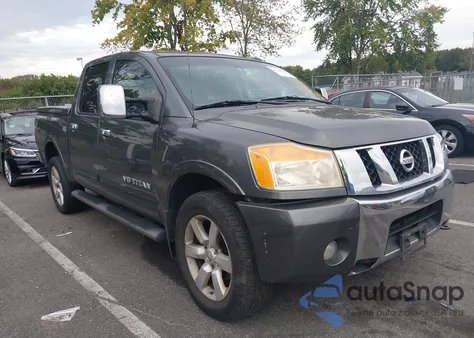 2011 Nissan Titan Sl z USA, uszkodzony, nr VIN 1N6AA0EC0BN318840
